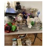 Home decor and dishes on and under table