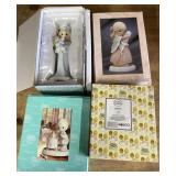 4 Precious Moments figurines