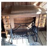 Treadle sewing machine cabinet