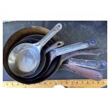 Group of pressed steel skillets