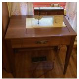 Singer sewing machine and cabinet