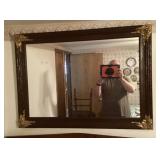 Wall mirror with gilt corners