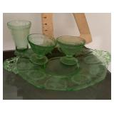 Green Depression glass cake plate, sherbets, glass