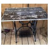 Treadle sewing machine base with table top