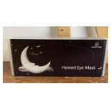 Heated eye mask