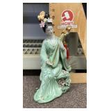 Porcelain geisha figurine