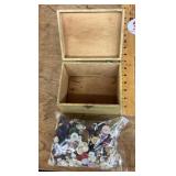 Wooden box of old buttons