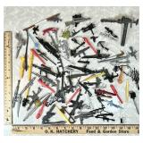 Large lot of action figure weapons