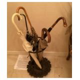 Heavy umbrella stand with umbrellas