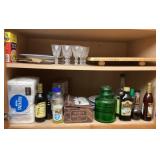 Contents of cabinet above refrigerator