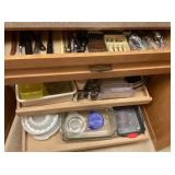 Contents of kitchen drawer and lower cabinet