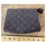 Cosmetic bag marked Louis Vuitton