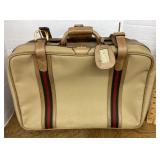 Suitcase marked Gucci
