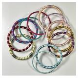 12 thread-wrapped bangle bracelets