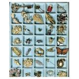 Costume jewelry brooches & stick pins