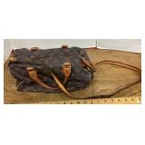 Purse marked Louis Vuitton