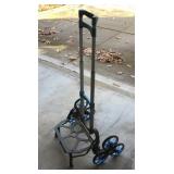 Folding stair-climbing hand cart