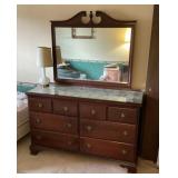 Dresser with mirror and lamp