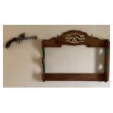 Gun rack with decor gun