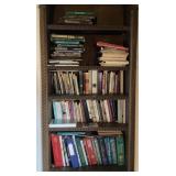 Books on shelves and frames in box