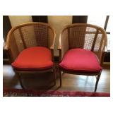 2 caned barrel chairs with cushion seats