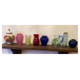 Glass and pottery on shelf