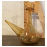 Amber glass porron wine carafe