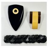 Carved Bakelite brooch & 2 Bakelite dress clips