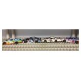 4 diecast race cars 1:24