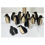 Colony of 11 wooden slotted penguin figures
