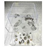 Religious jewelry in 3-drawer plastic storage