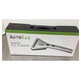 Heated ice scraper