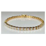 Gold over sterling silver tennis bracelet