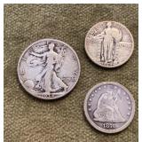 Silver half dollar and 2 silver quarters