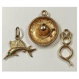 Three 14k gold charms