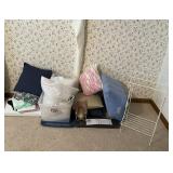 Linens, pillows, tote, towel rack, brass sconce