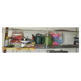 Shelf contents in garage with kites,