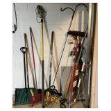 Long handle tools in corner