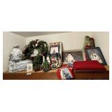 Closet top shelf with Christmas dï¿½cor