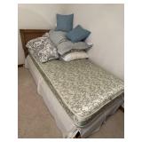 2 twin beds and bed linens