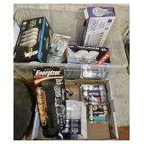 Large group of light bulbs and batteries