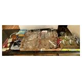 All on top of bar with bar glasses, opener,