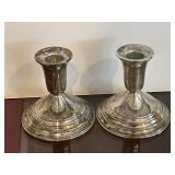 Pair of weighted sterling candle holders