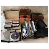 Group of media: 45s, CDs, DVDs, cassettes