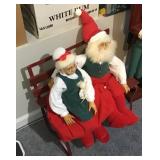 Santa and Mrs. Claus on bench