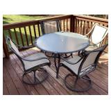 Patio table, 4 chairs, and planter