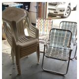 Group of stacking and folding lawn chairs