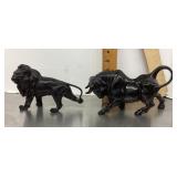 Lion and bull figures