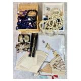 Beaded necklaces, fans, pop beads, belts, etc.