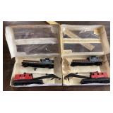 2 Tyco HO operating cranes with boom tender